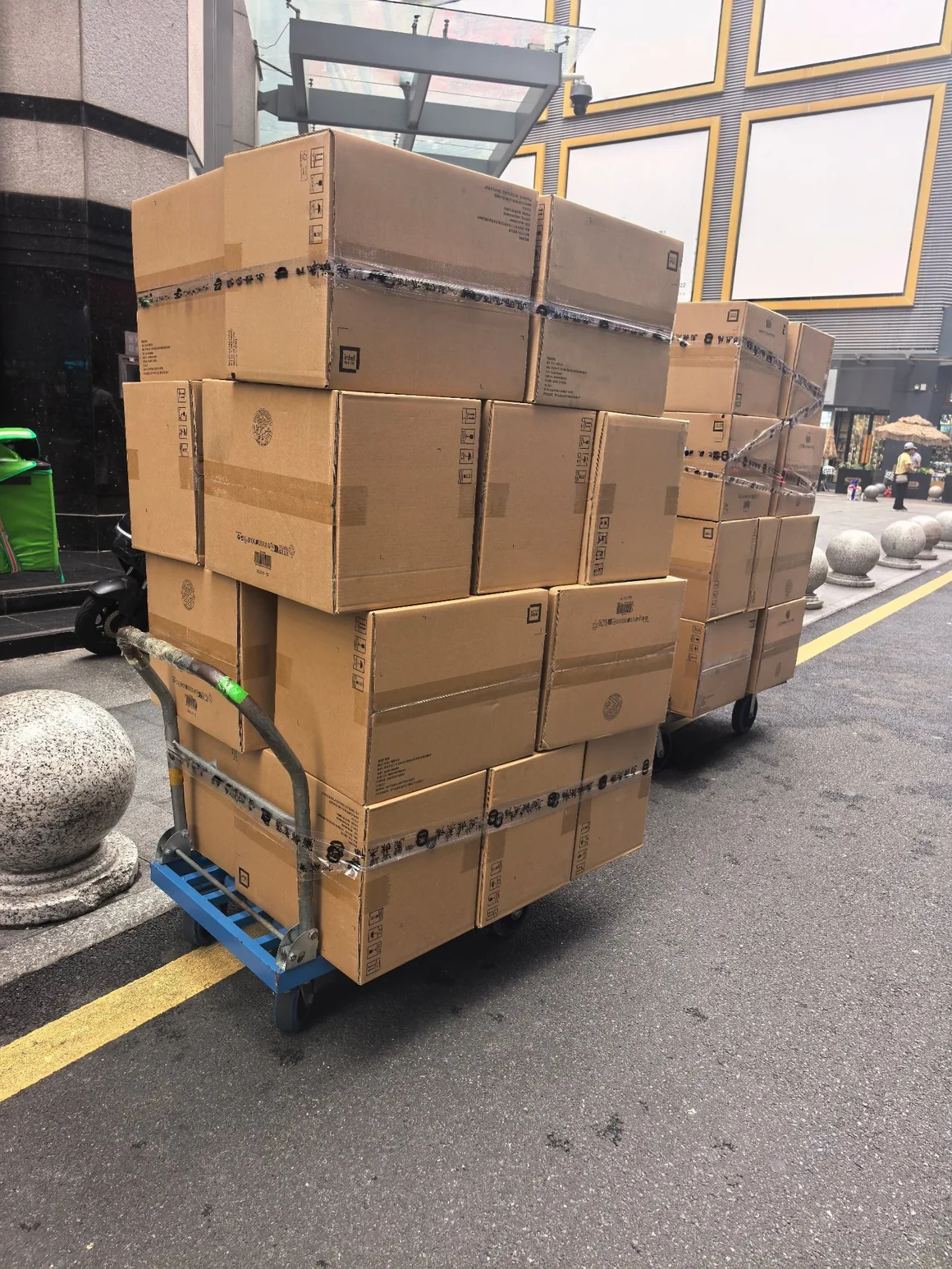Cartons of electronic components loaded for shipment in Huaqiangbei, Shenzhen