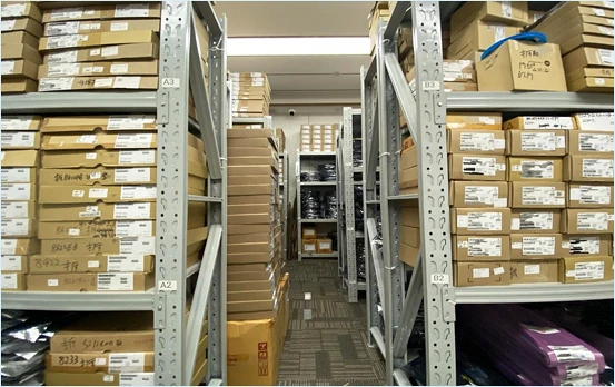 Shenzhen Jingteng Electronics warehouse aisle with stocked shelves