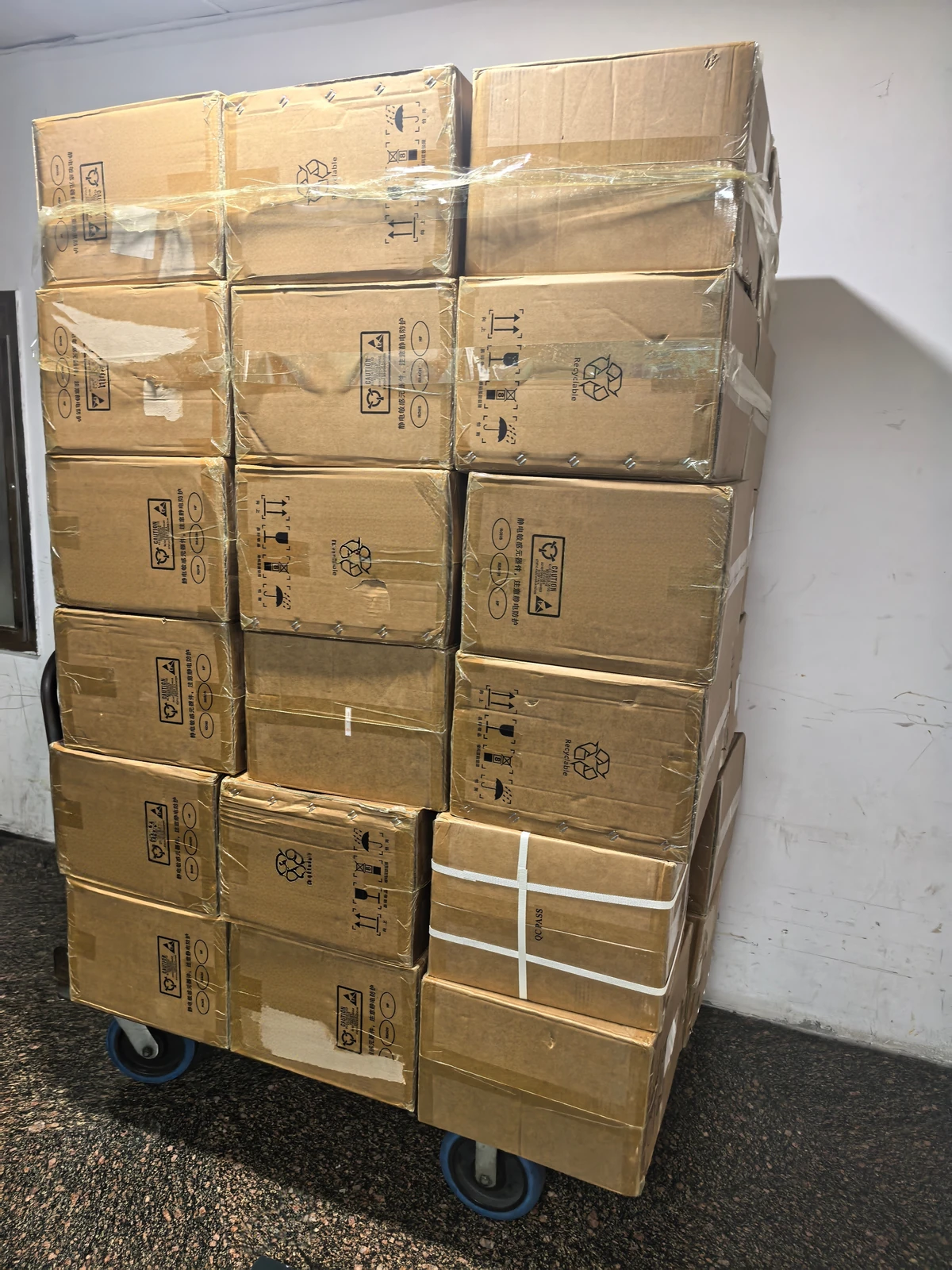 Labelled anti-static cartons of electronic components staged for dispatch at Shenzhen Jingteng Electronics