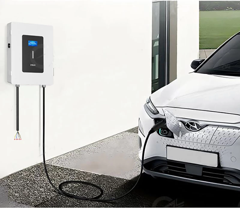 D9 wall-mounted DC fast charger installed outdoors charging an electric vehicle – Tylon Technology