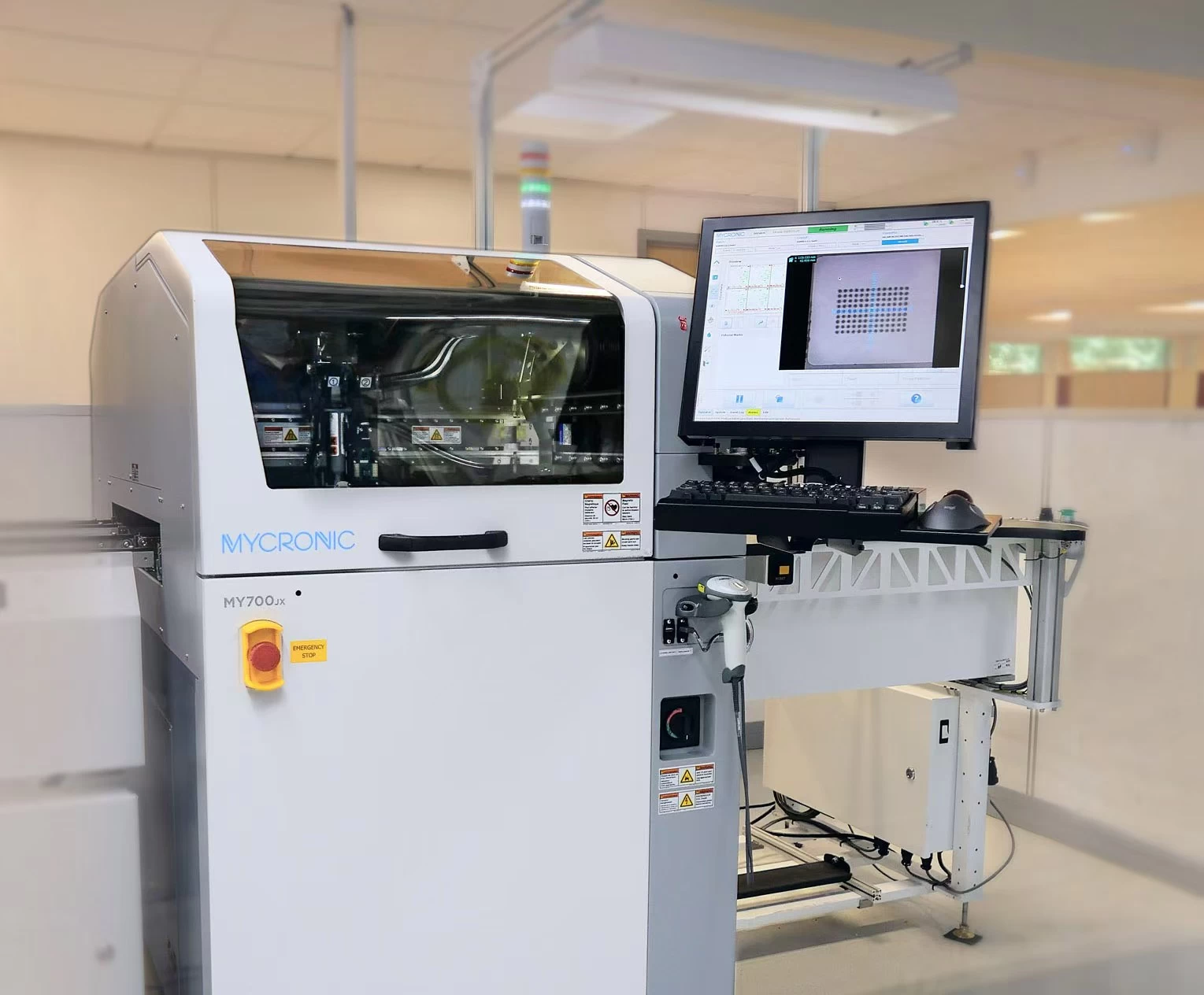 Automated electronics production machine with monitoring screen